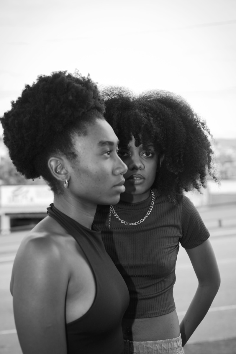 Two people with beautiful 4C coily hair afros
