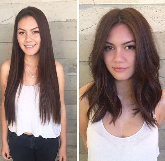 Wolf cut on wavy hair with volume at the crown and face-framing layers